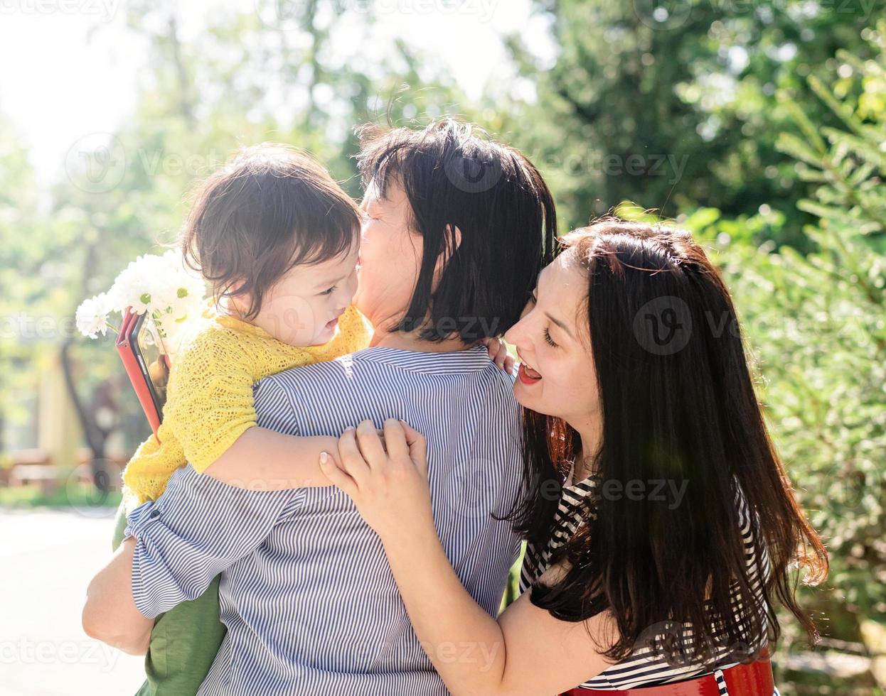 Multi generation portrait of grandma with daughter and granddaughter photo