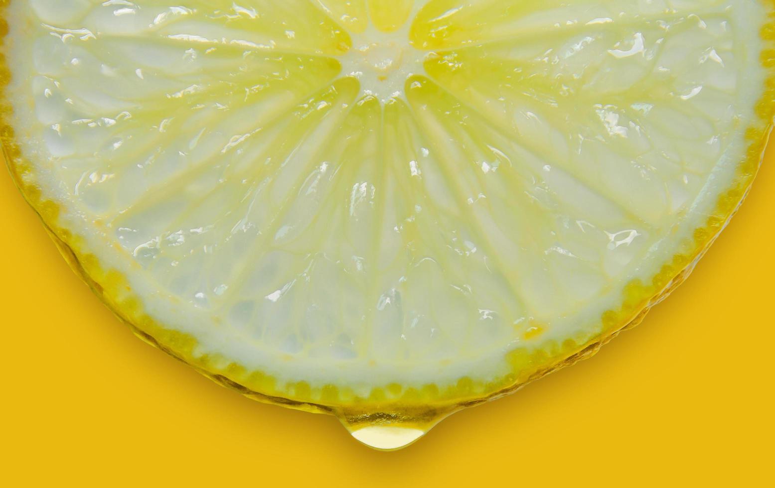 Lemon and lime slice and fresh citrus fruit on yellow background. photo