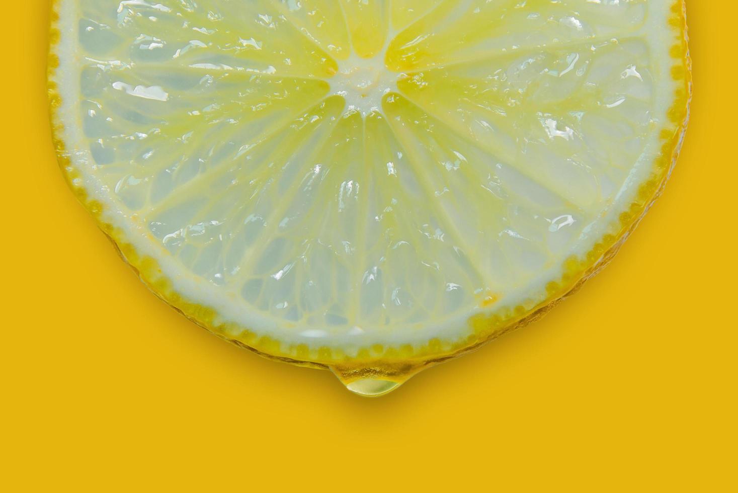 Lemon and lime slice and fresh citrus fruit on yellow background. photo