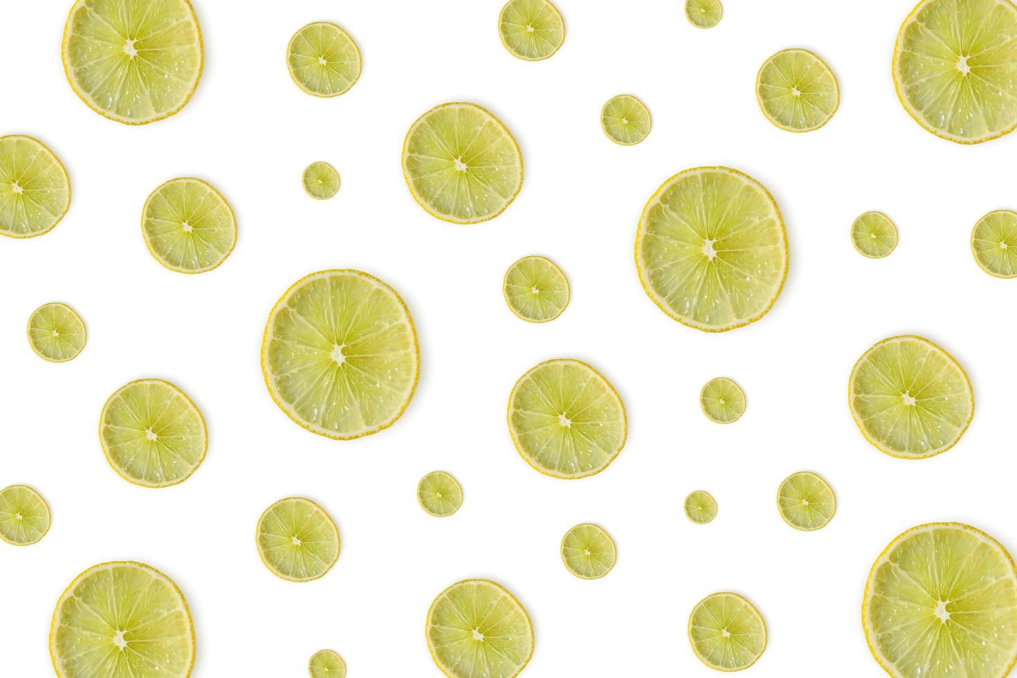 Lemon and lime slice and fresh citrus fruit on white background. photo