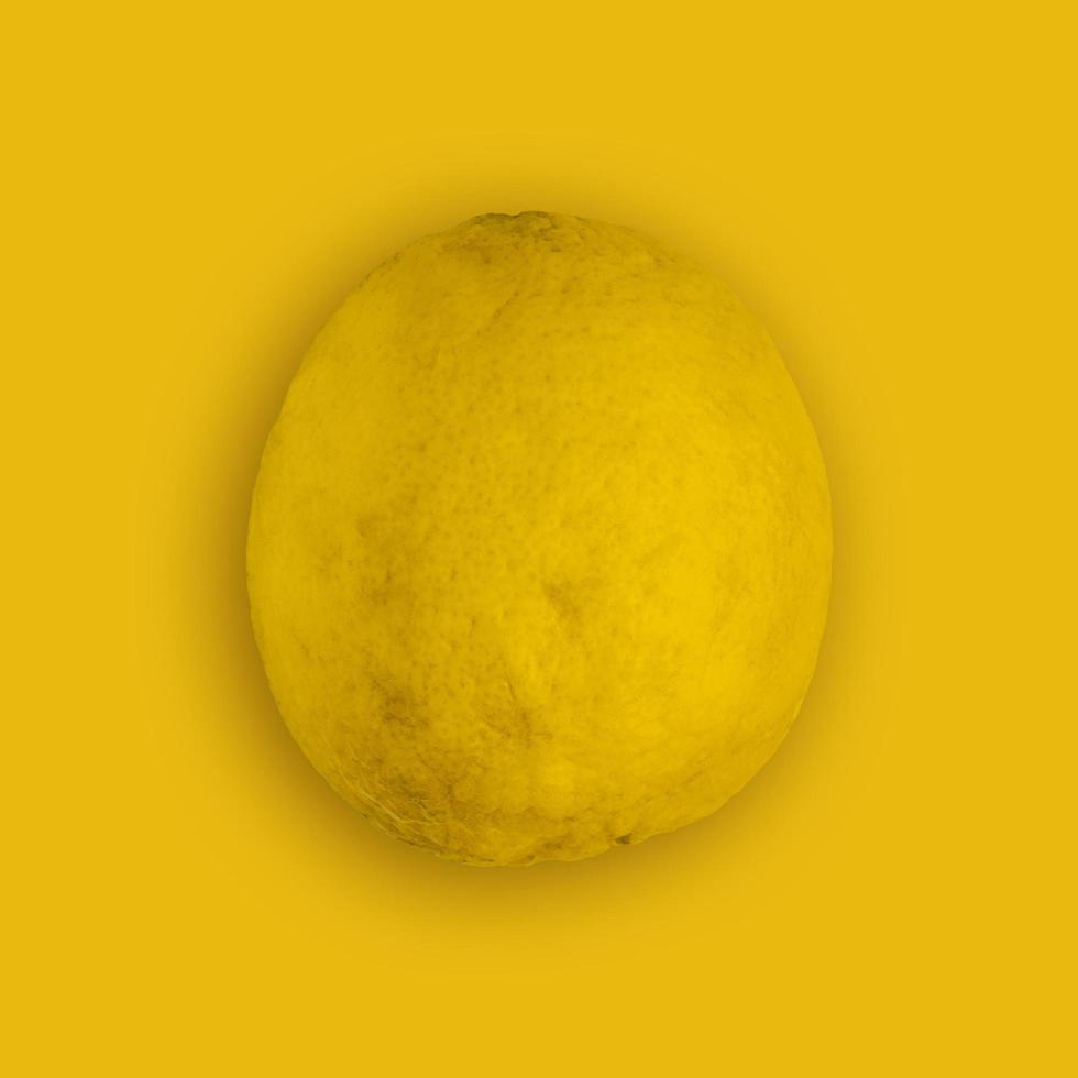 Lemon and lime slice and fresh citrus fruit on yellow background. photo