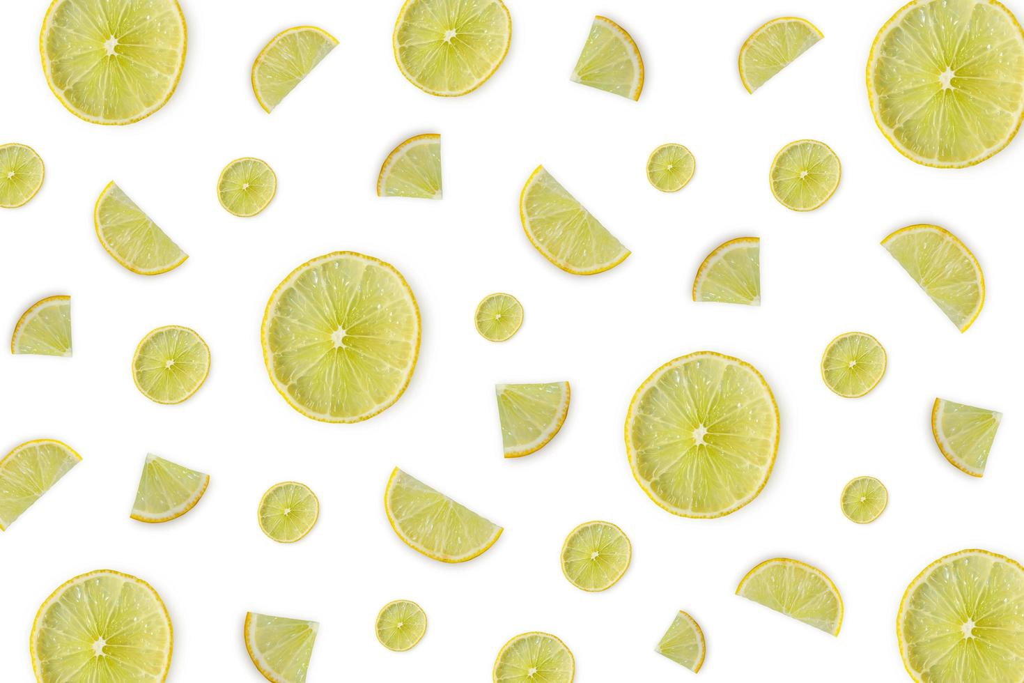 Lemon and lime slice and fresh citrus fruit on white background. photo