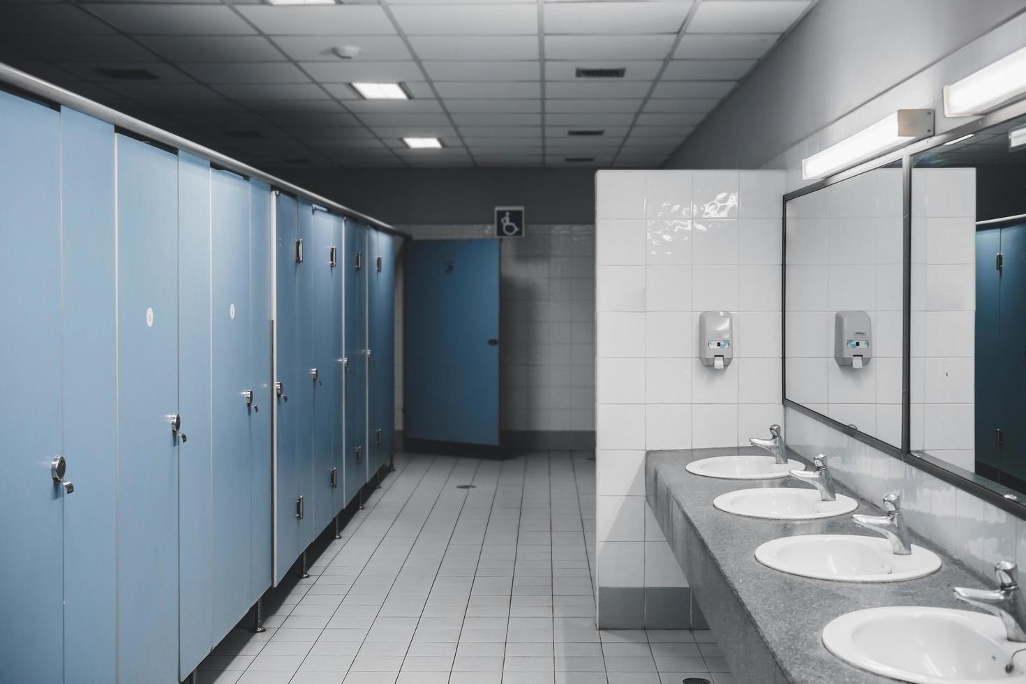 Public toilet and Bathroom interior with wash basin and toilet room. photo