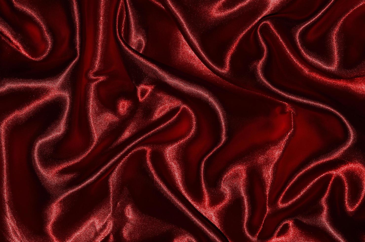 Fondo y papel tapiz de tela roja y textil a rayas. foto