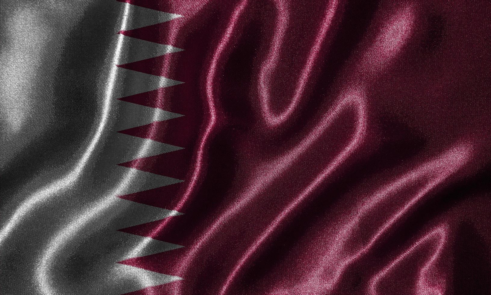 papel tapiz de la bandera de qatar y bandera ondeando por tela. foto