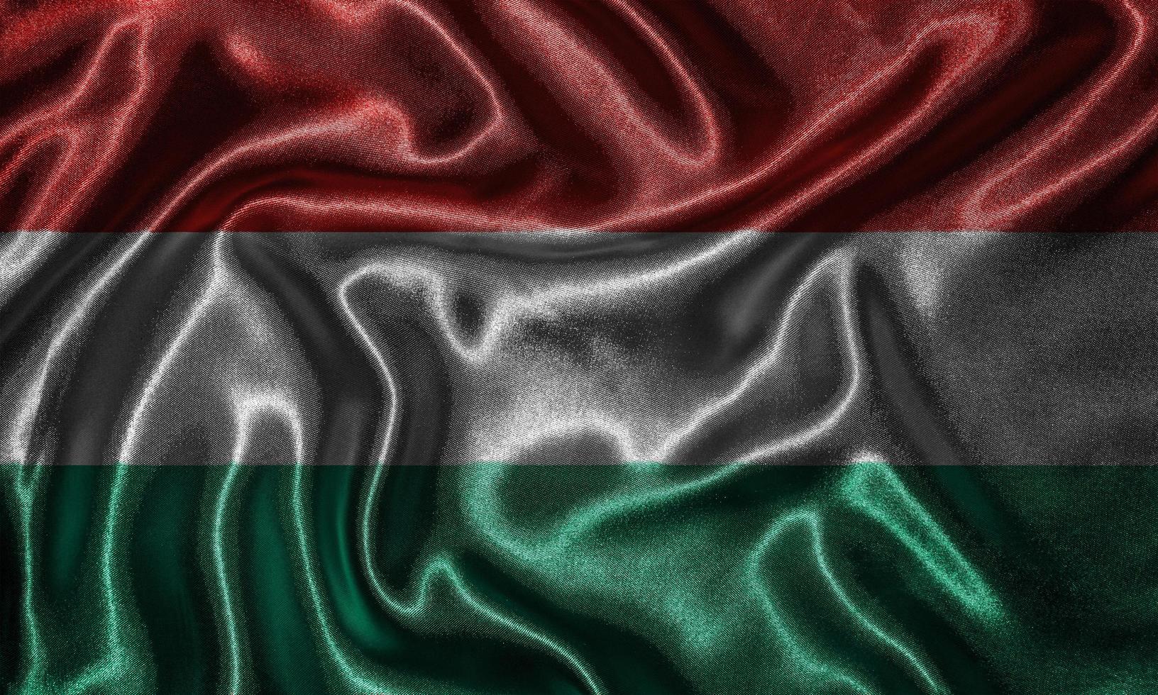 Wallpaper by Hungary flag and waving flag by fabric. photo