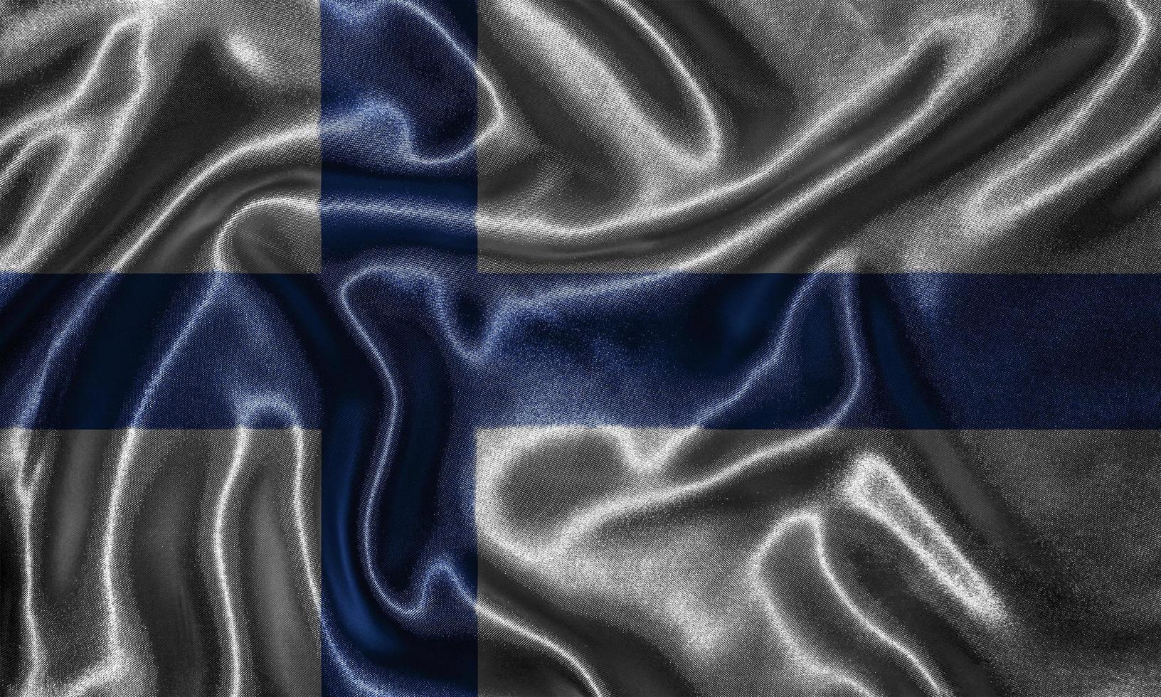 papel pintado de la bandera de Finlandia y bandera ondeando por la tela. foto