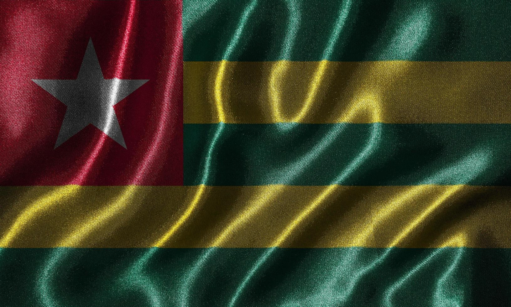 papel pintado de la bandera de Togo y bandera ondeante de la tela. foto