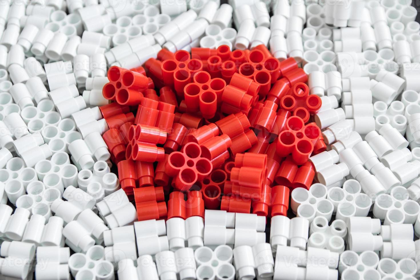 Colorful plastic bricks that form the flag of Japan photo