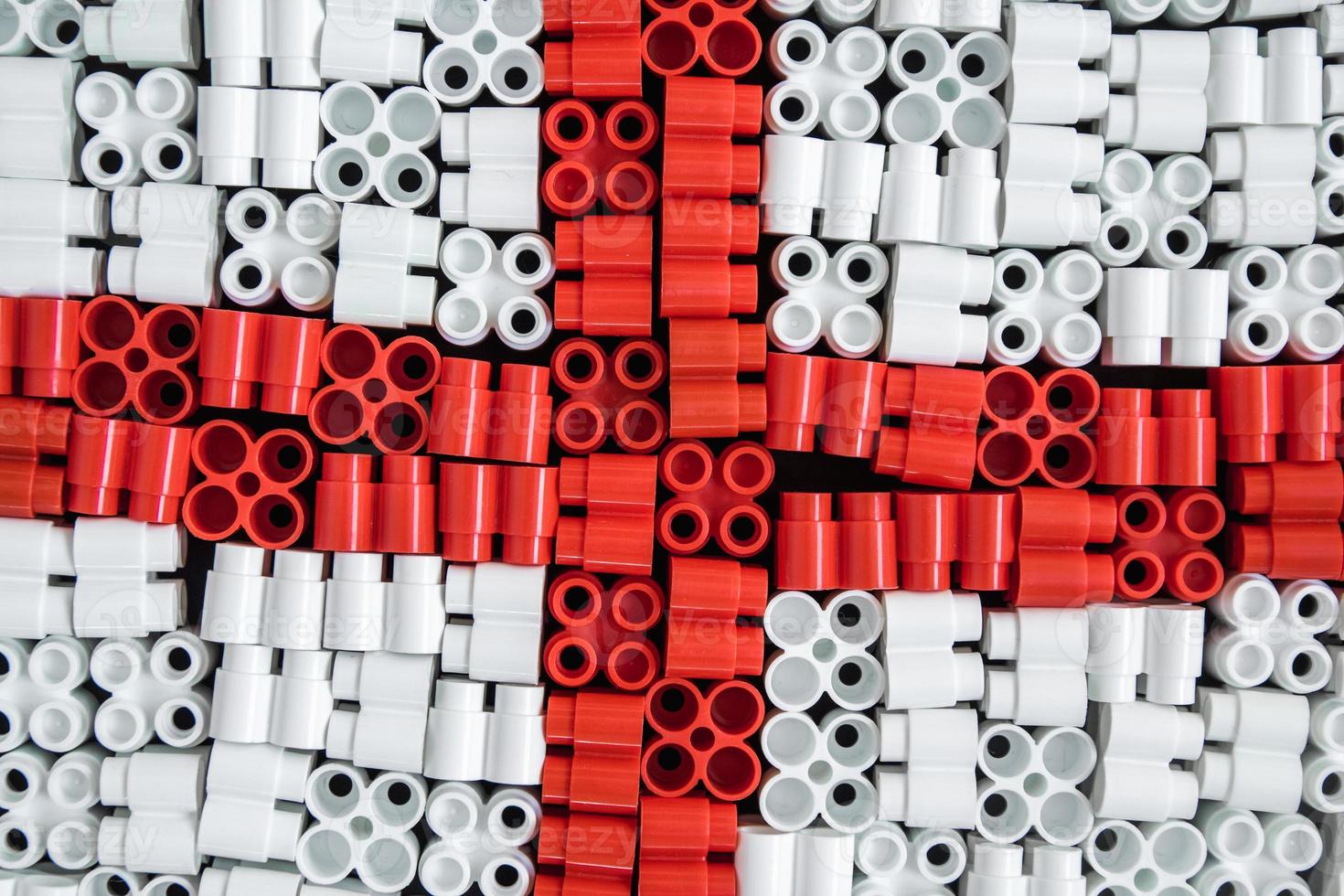 plastic bricks that form the flag of England on the background photo