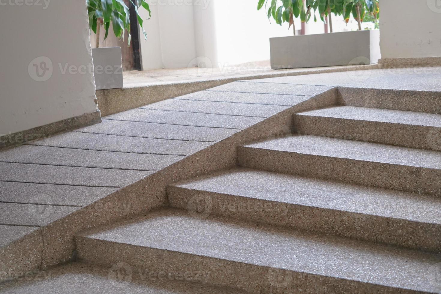 Building entrance trail with ramp for disabled person wheelchair. photo