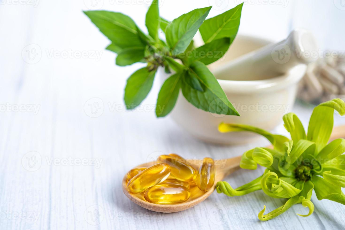 Alternative medicine herbal organic capsule vitamin E omega 3 fish oil photo