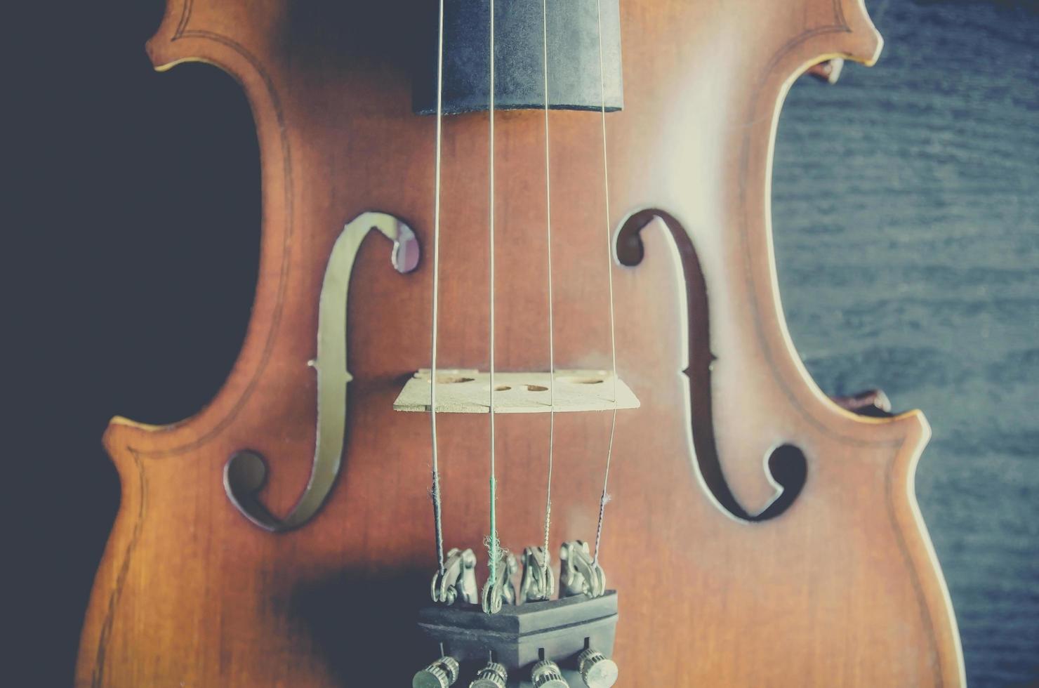 The violin on table, Classic musical instrument used in the orchestra. photo