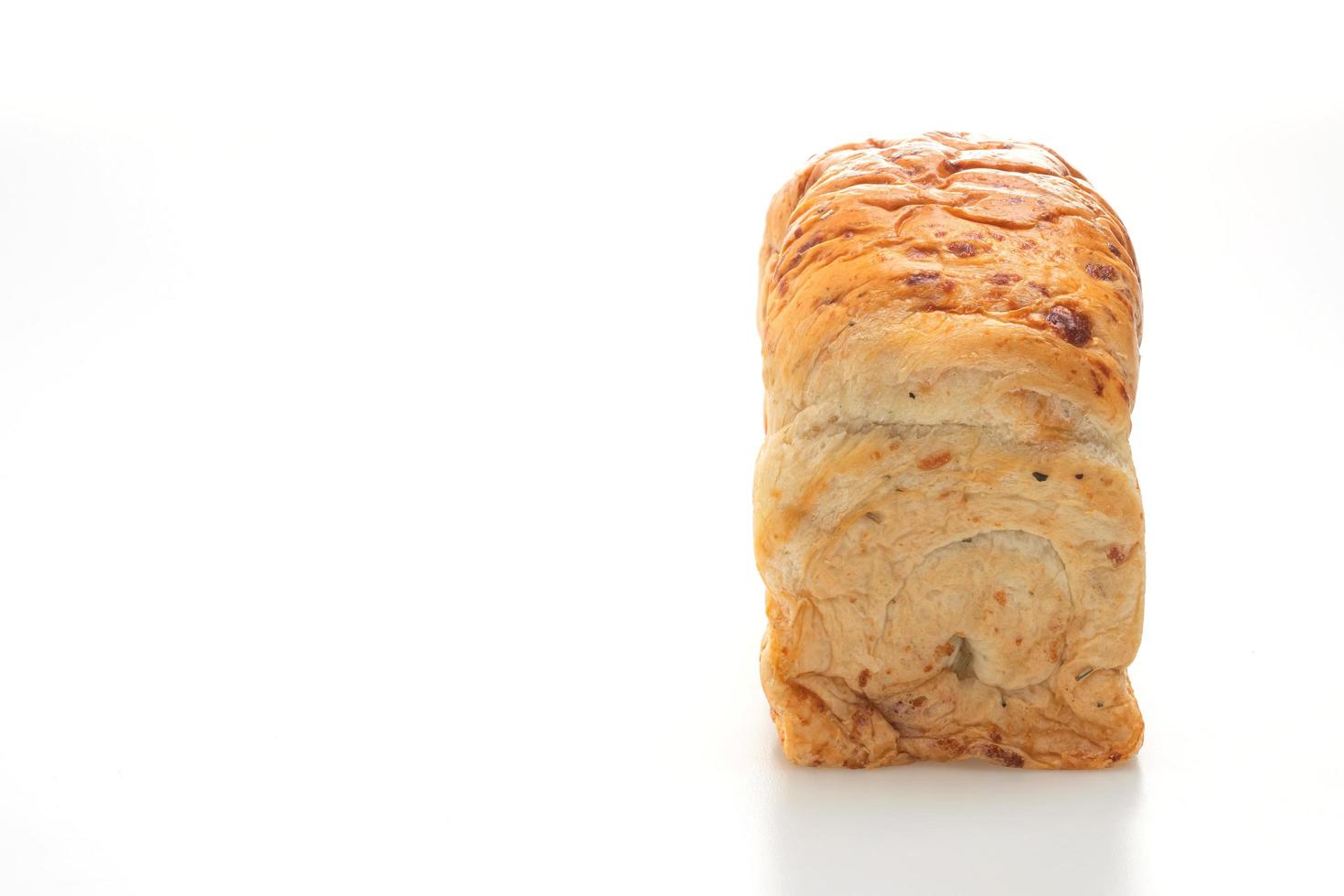 Loaf of bread on white background photo