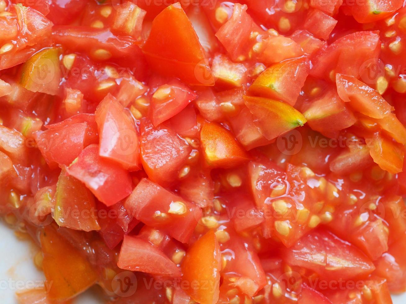 Chopped tomato for pizza photo