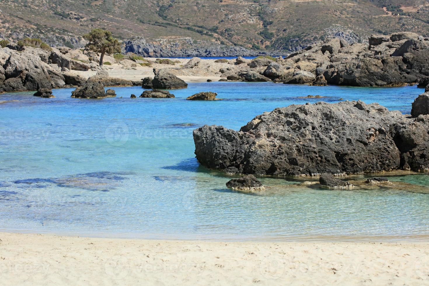 Blue lagoon kedrodasos beach crete island red sand waters background photo