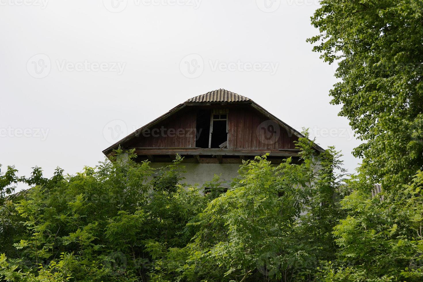 Beautiful old abandoned building farm house in countryside photo