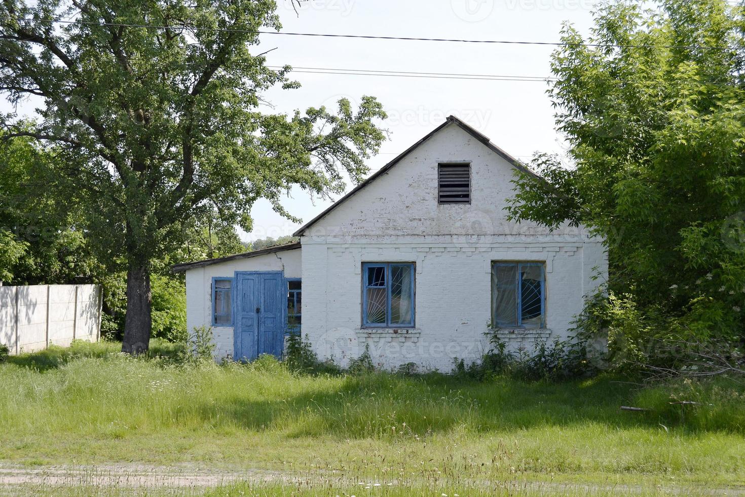 Beautiful old abandoned building farm house in countryside photo