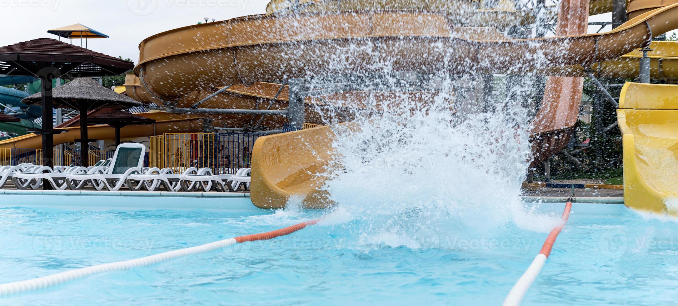 Person splashing in the pool photo