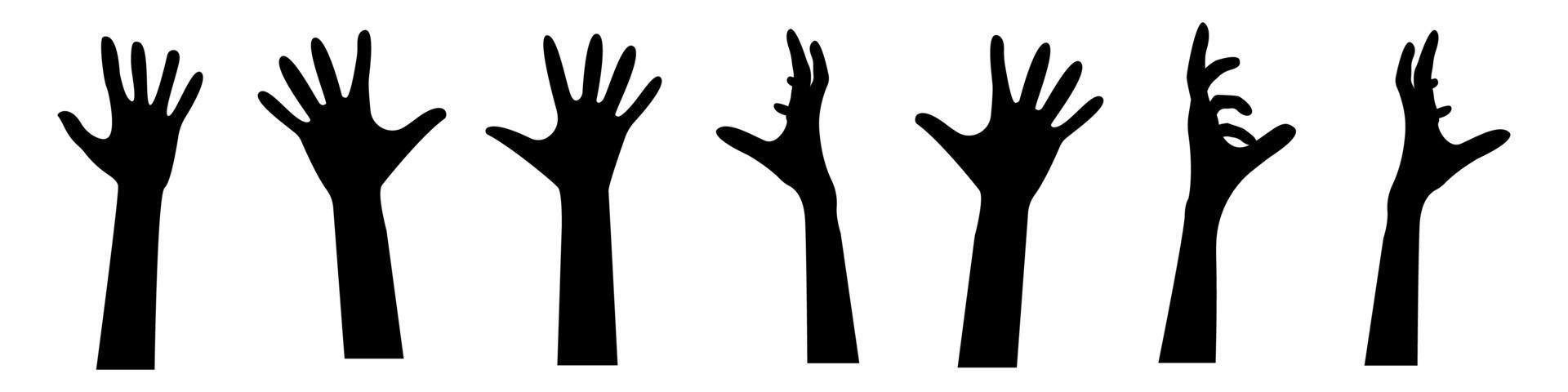 A set of zombie hands from the ground. silhouettes of human hands vector