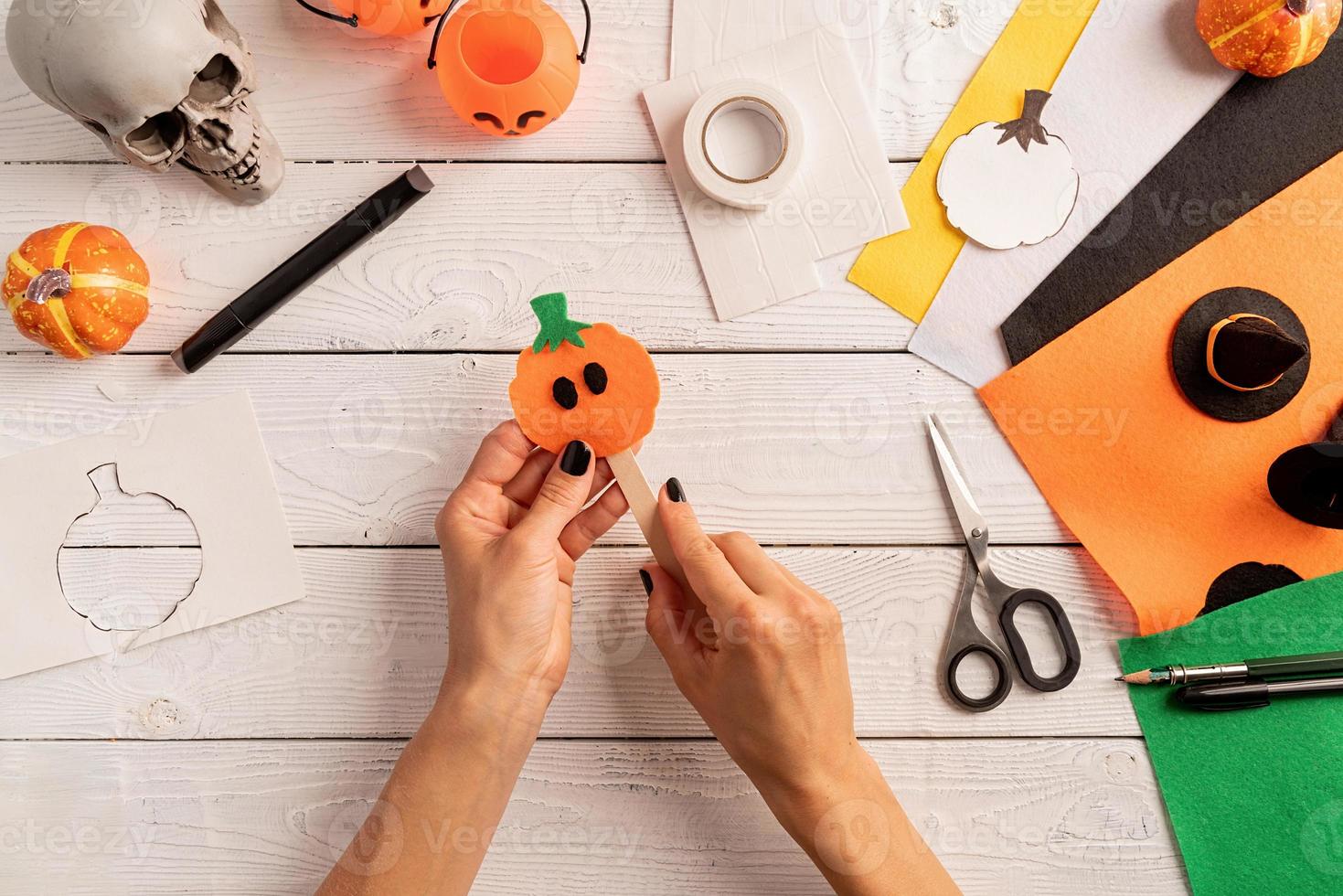 Step by step instruction of making Halloween bookmark DIY pumpkin photo