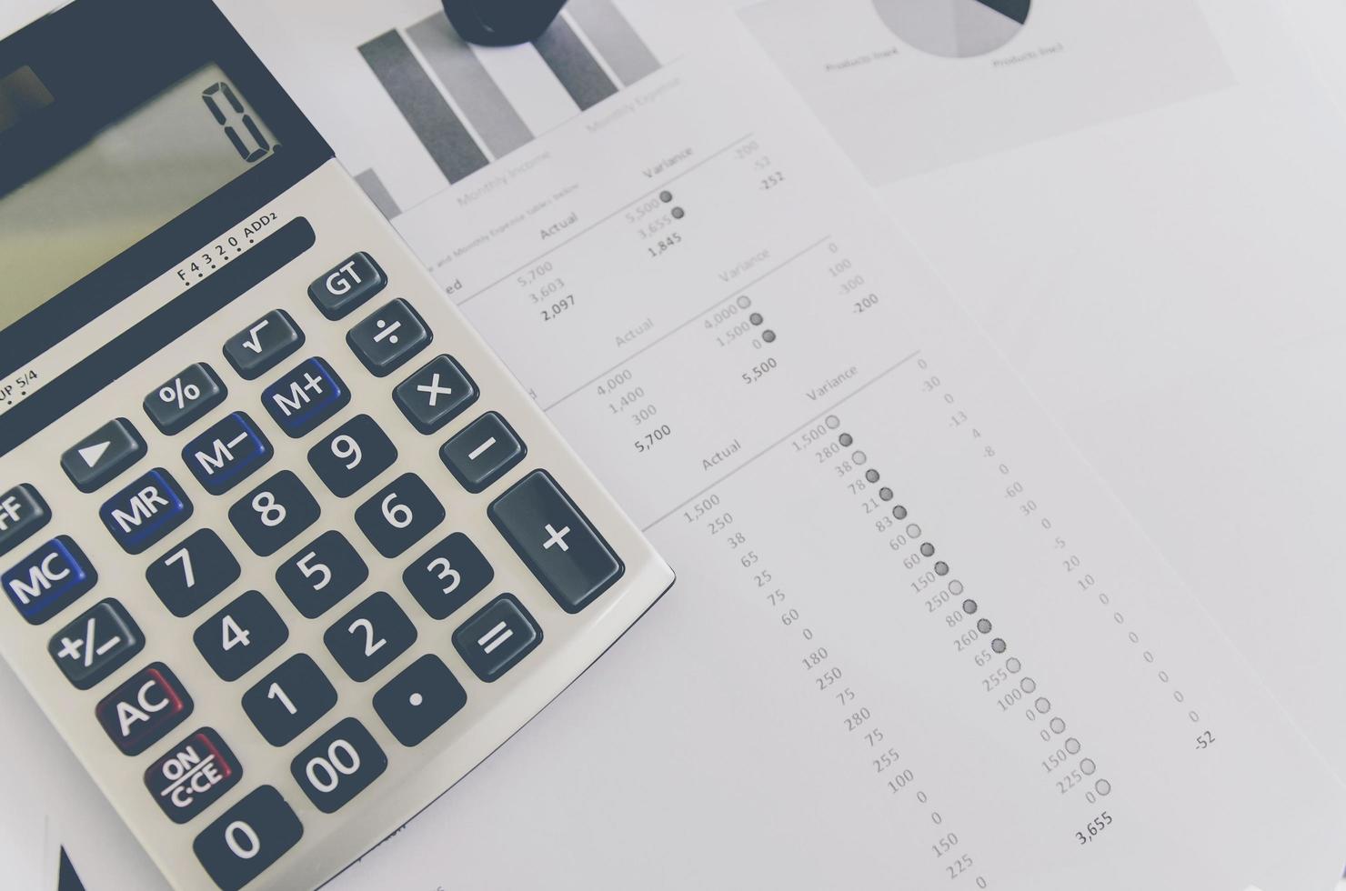 Business concept of financial and accounting with paper sheet. photo