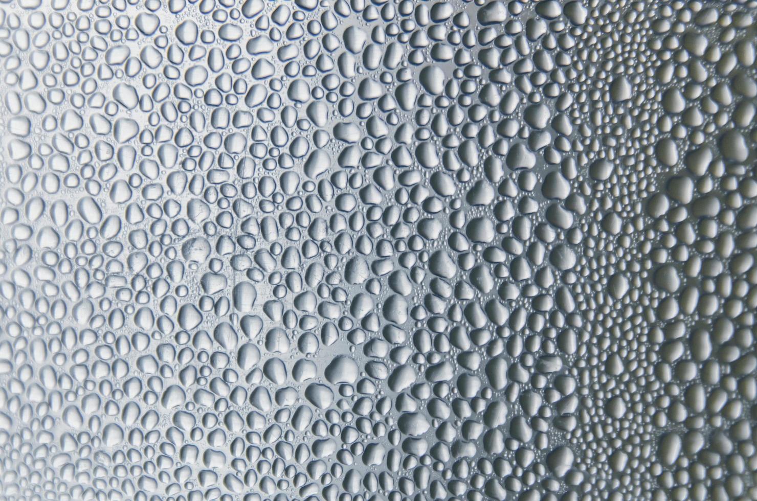 Background and wallpaper by rainy drop and water drops on window. photo