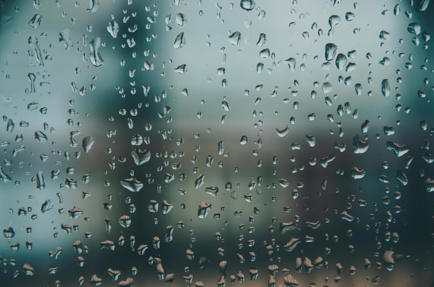 Background and wallpaper by rainy drop and water drops on window. photo