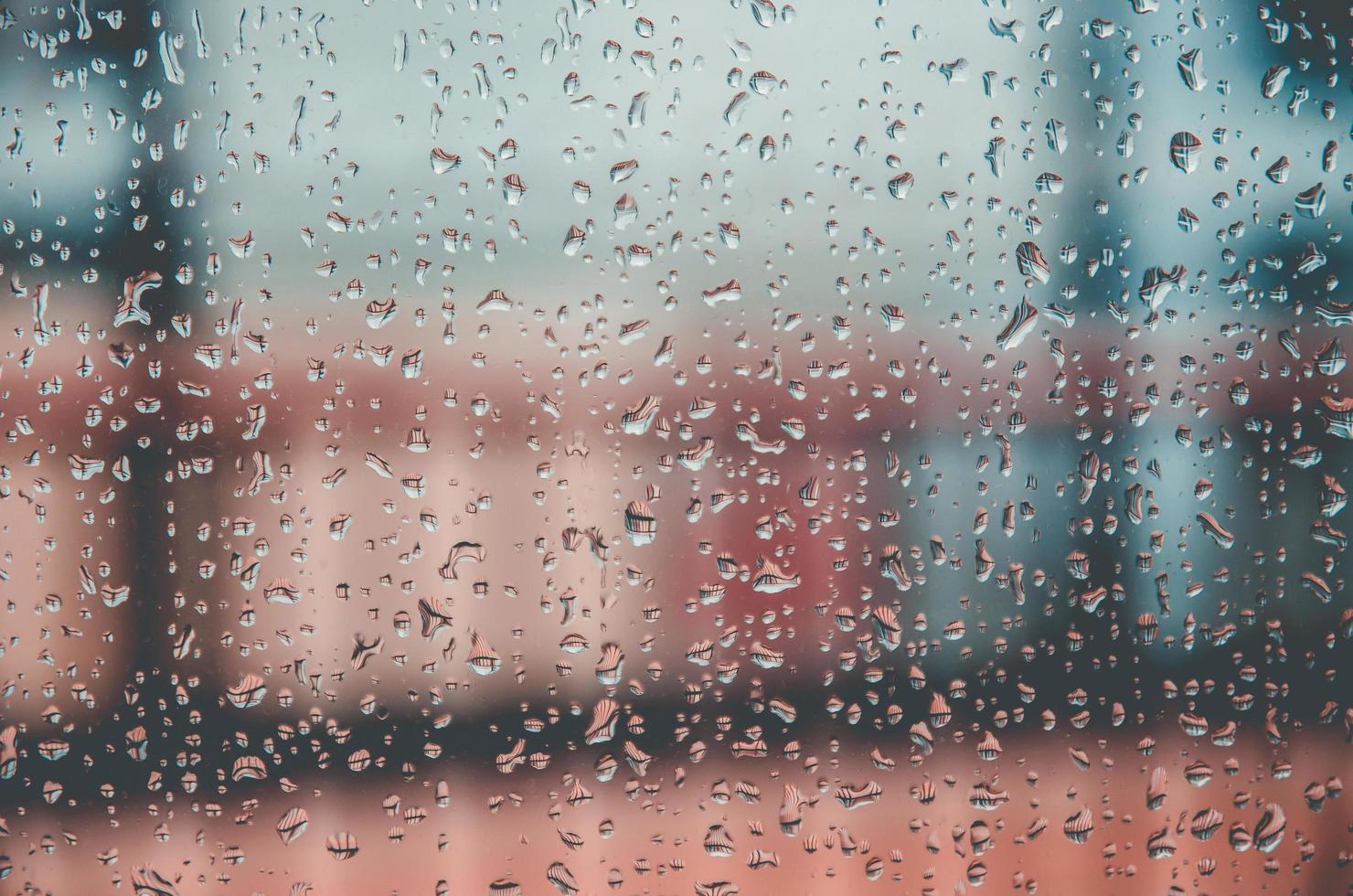 Background and wallpaper by rainy drop and water drops on window. photo