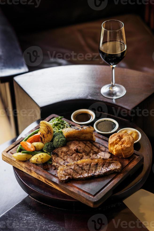 Traditional English Sunday roast beef with vegetables photo