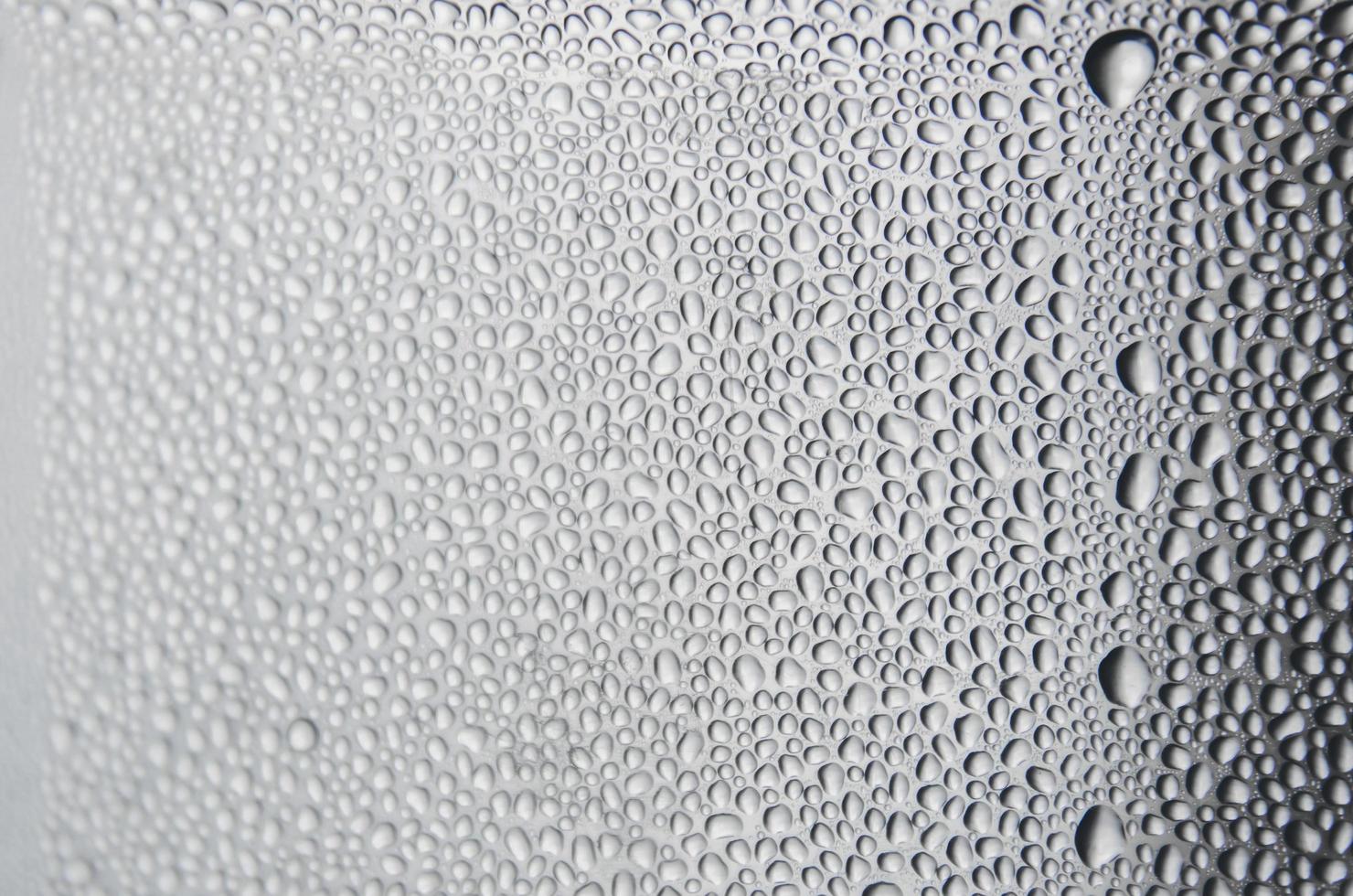 Background and wallpaper by rainy drop and water drops on window. photo