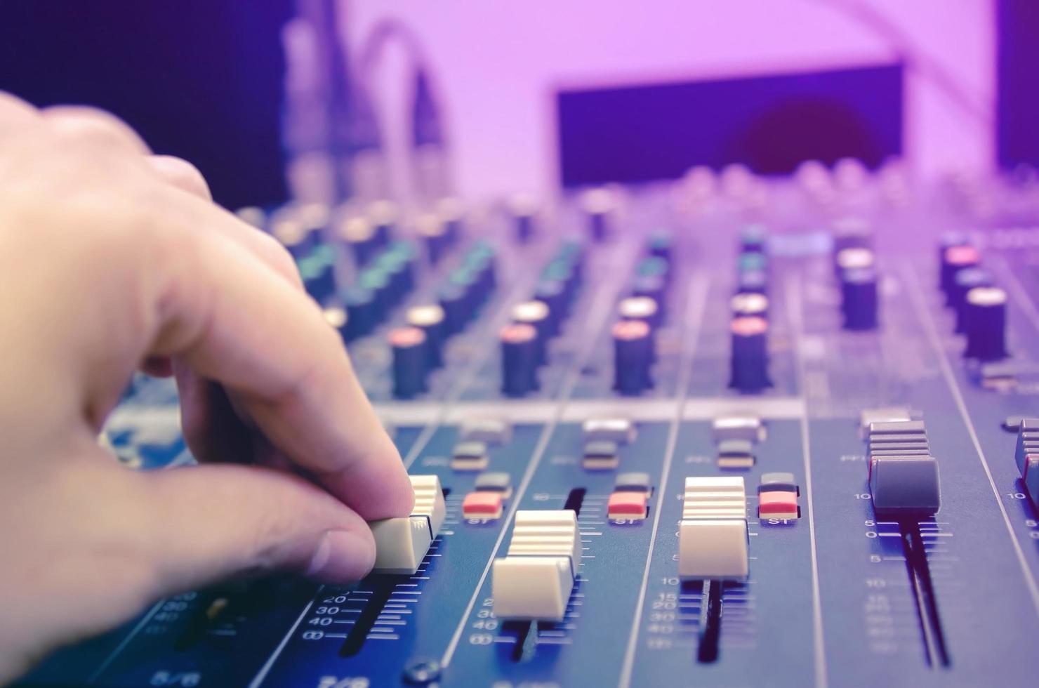 Audio mixer console and sound mixing with buttons and sliders. photo