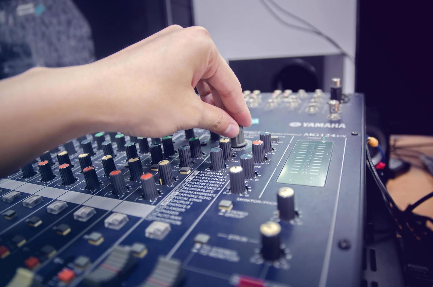 Audio mixer console and sound mixing with buttons and sliders. photo
