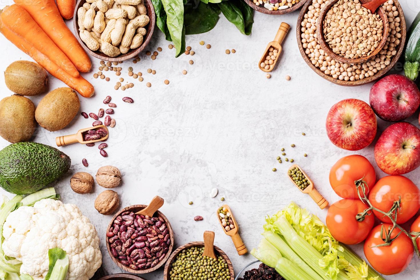 Top view of healthy food on white marble background photo