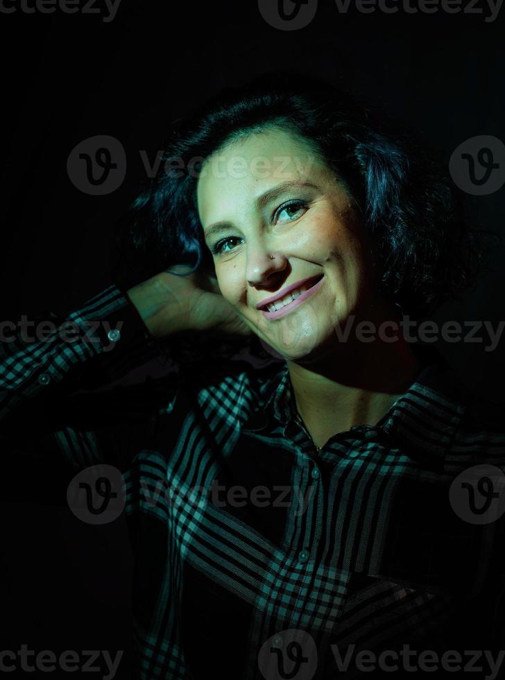 Woman with a shadow pattern on the face photo