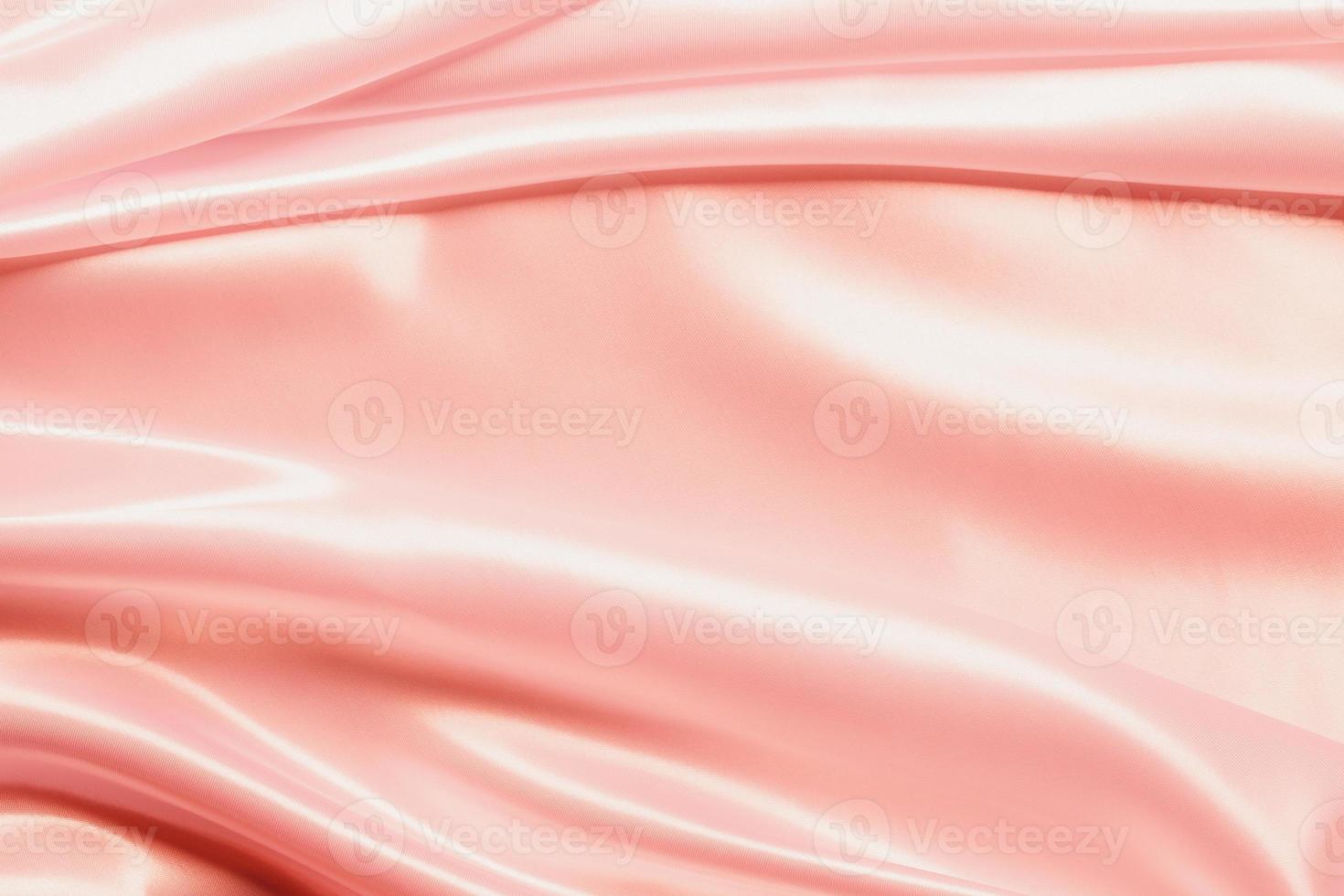 Abstract rose gold satin silky cloth for background photo