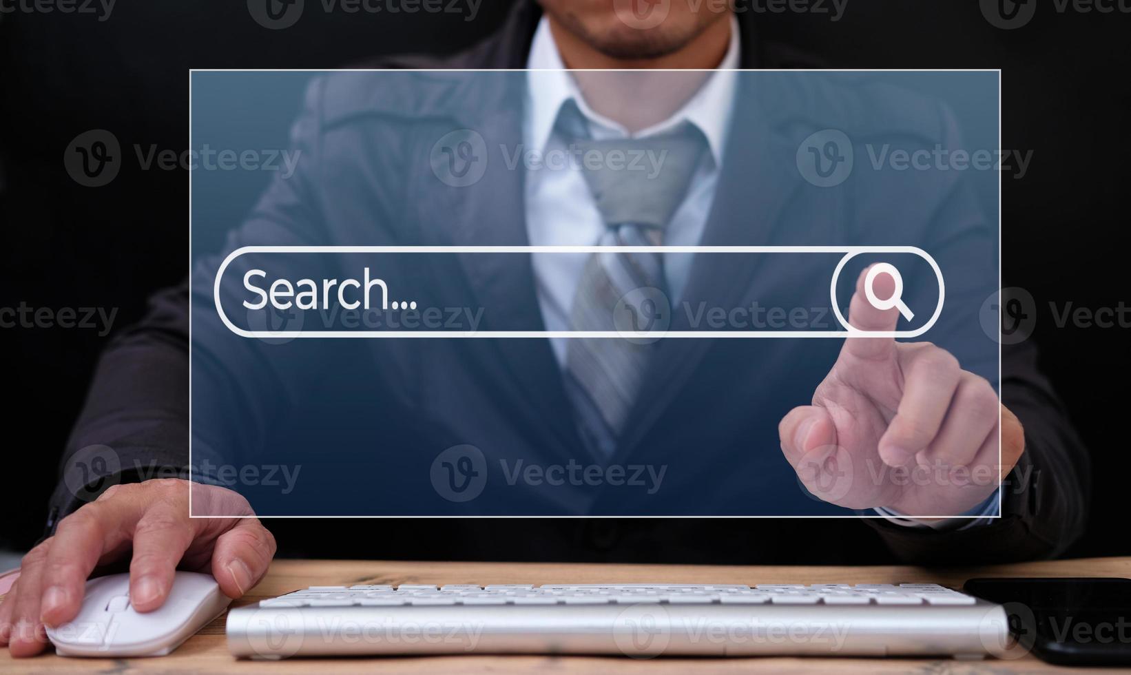 Searching on Internet with person using a browser software photo