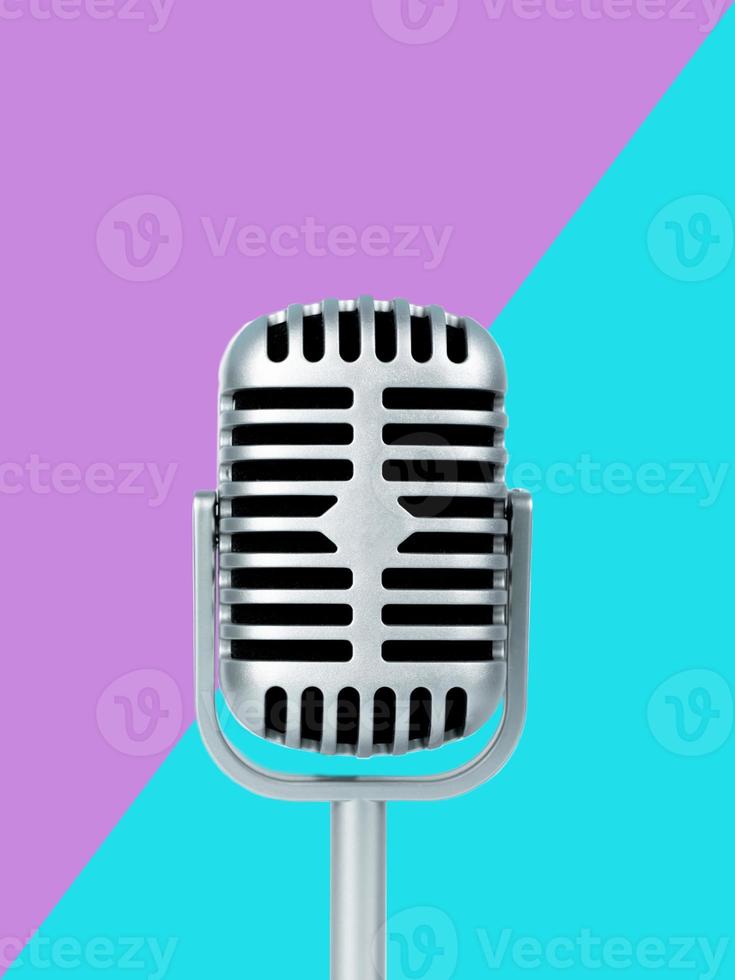 Microphone retro on color background photo