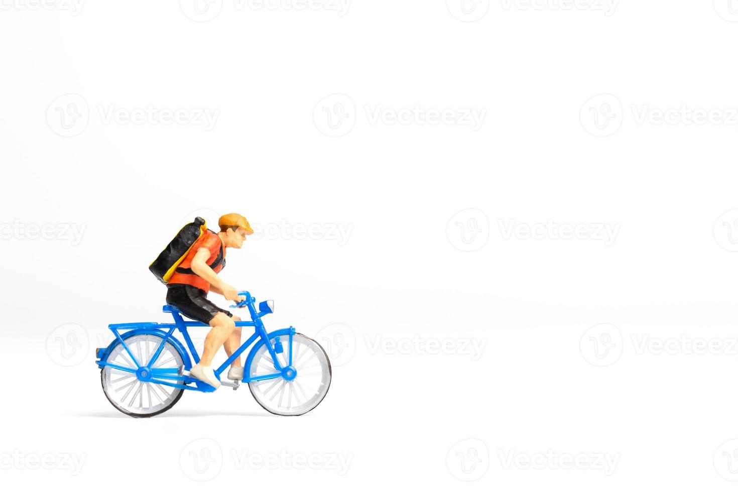 Miniature people Bicycle courier with parcel box on the back photo