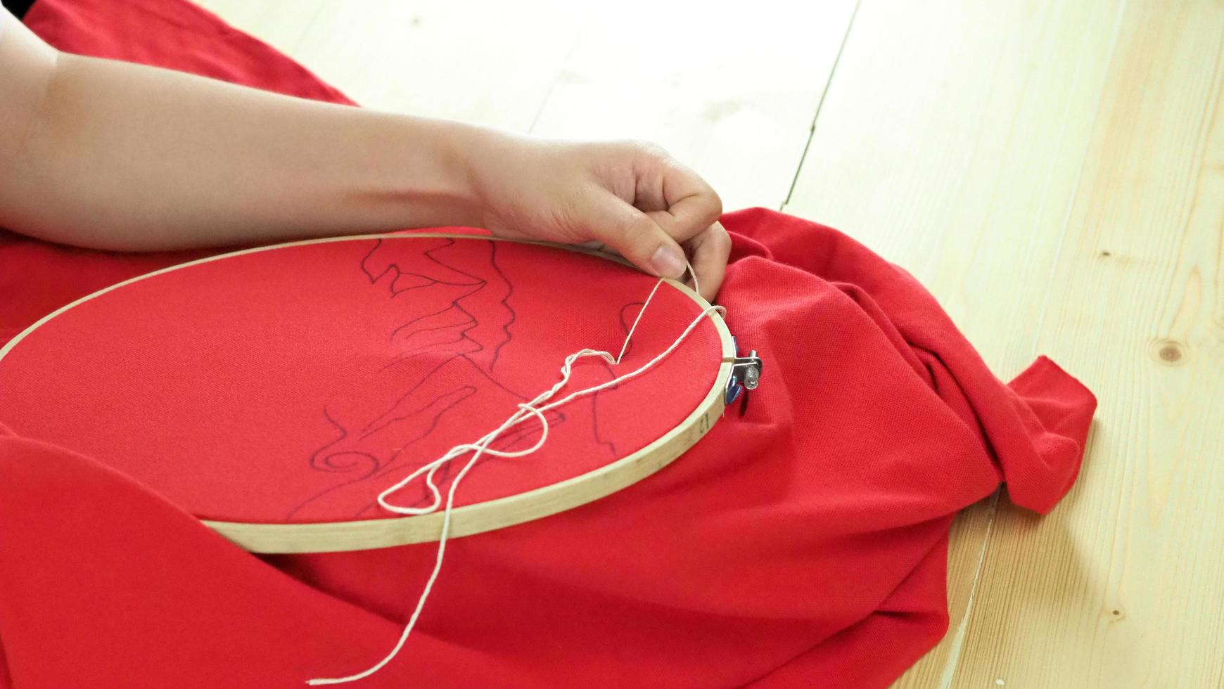 Embroider sewing by hand photo