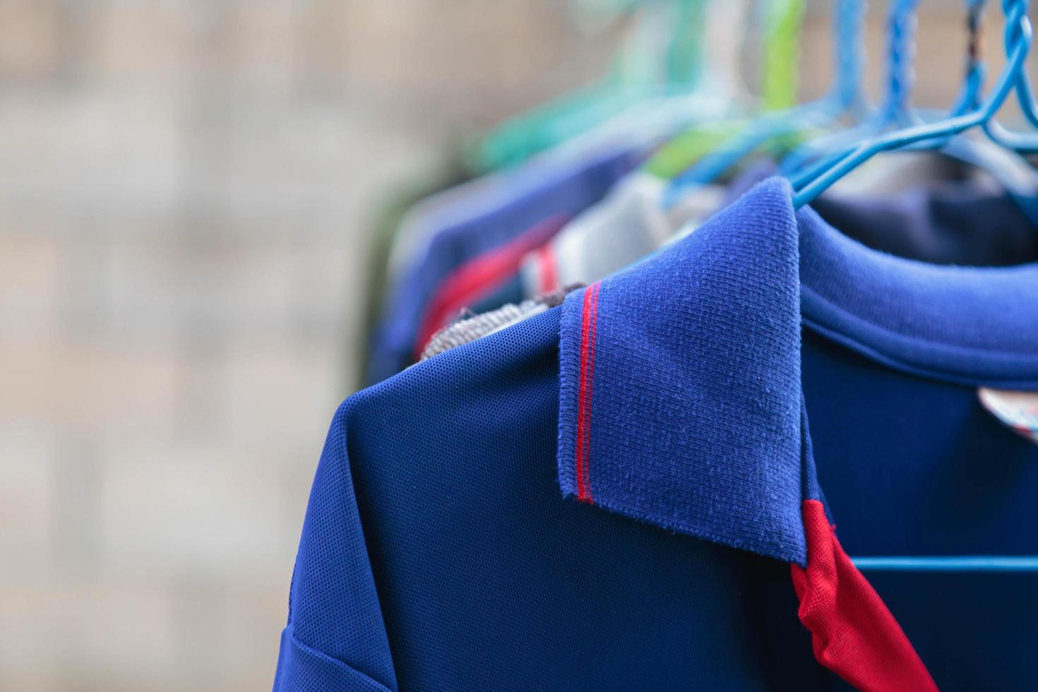 Dry clothes in bright colors in the sun. photo