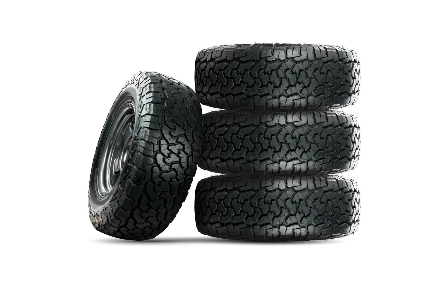 Set of 4 wheels car tires designed for use in all road conditions. photo