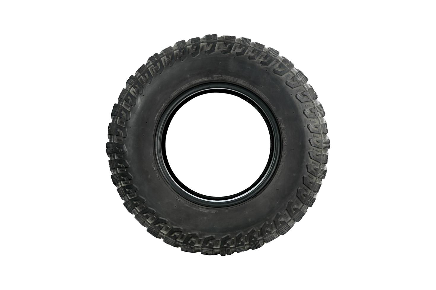 All terrain tire isolated on white background. photo