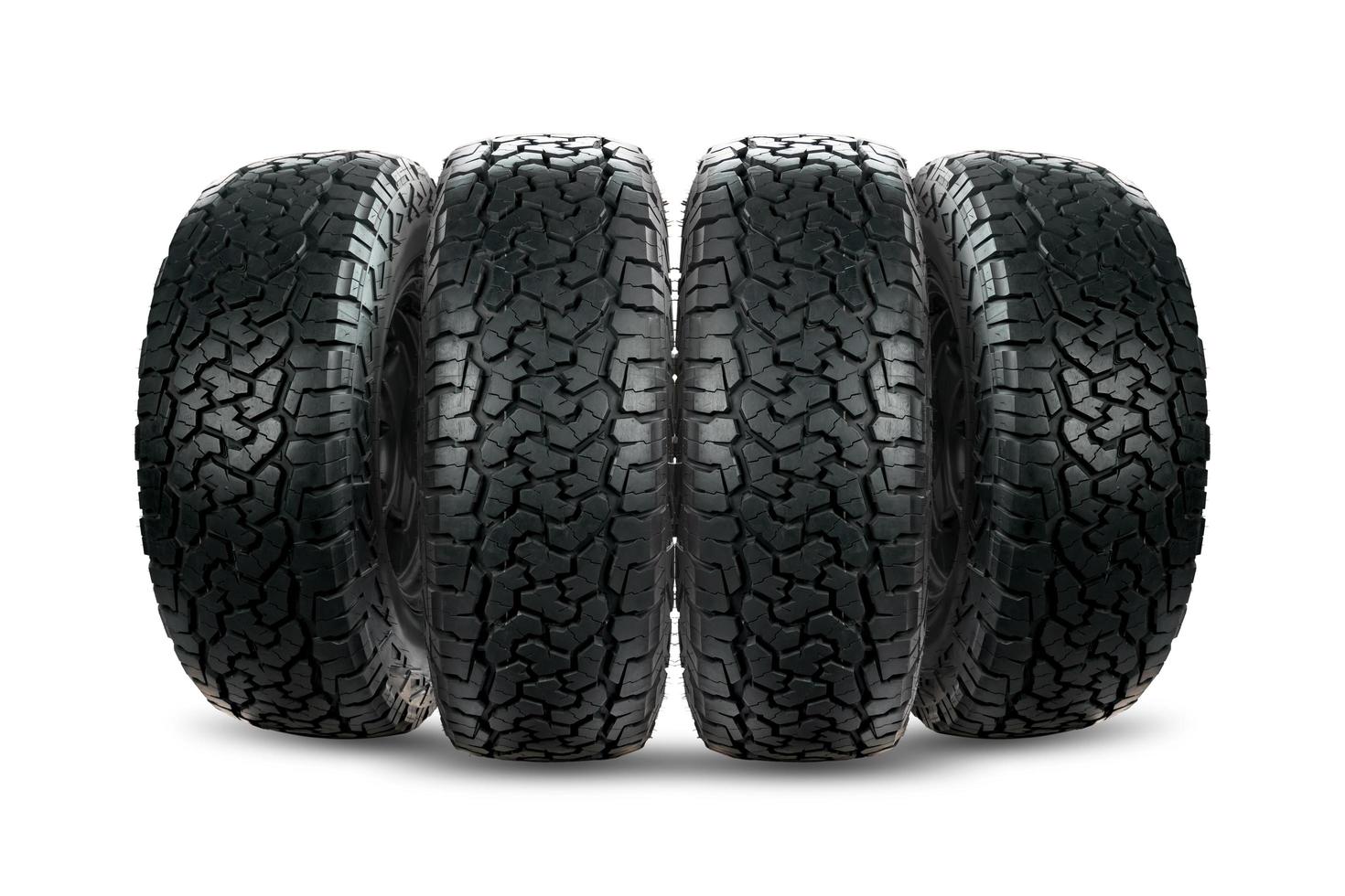 Set of 4 wheels car tires designed for use in all road conditions. photo