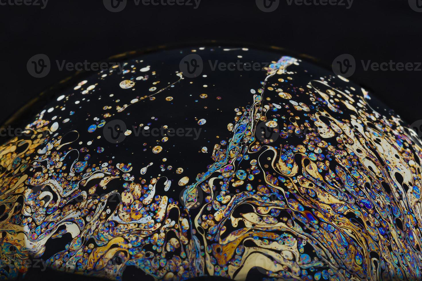 Beautiful psychedelic abstractions on the surface soap bubbles photo