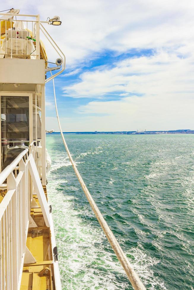 Landscape Panorama view of coast with turquoise water from ferry. photo