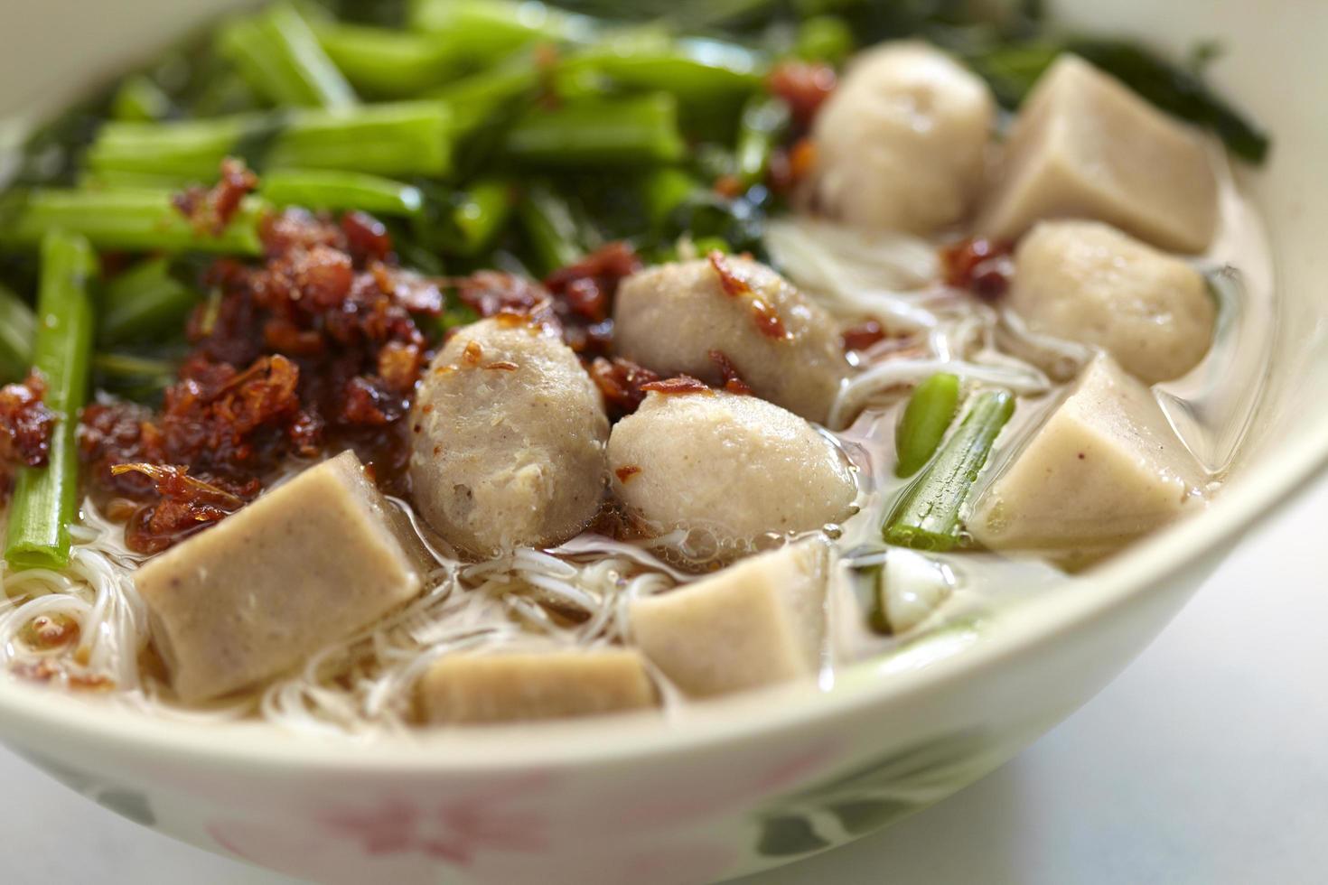 Close up Chinese meatball and chili soup photo