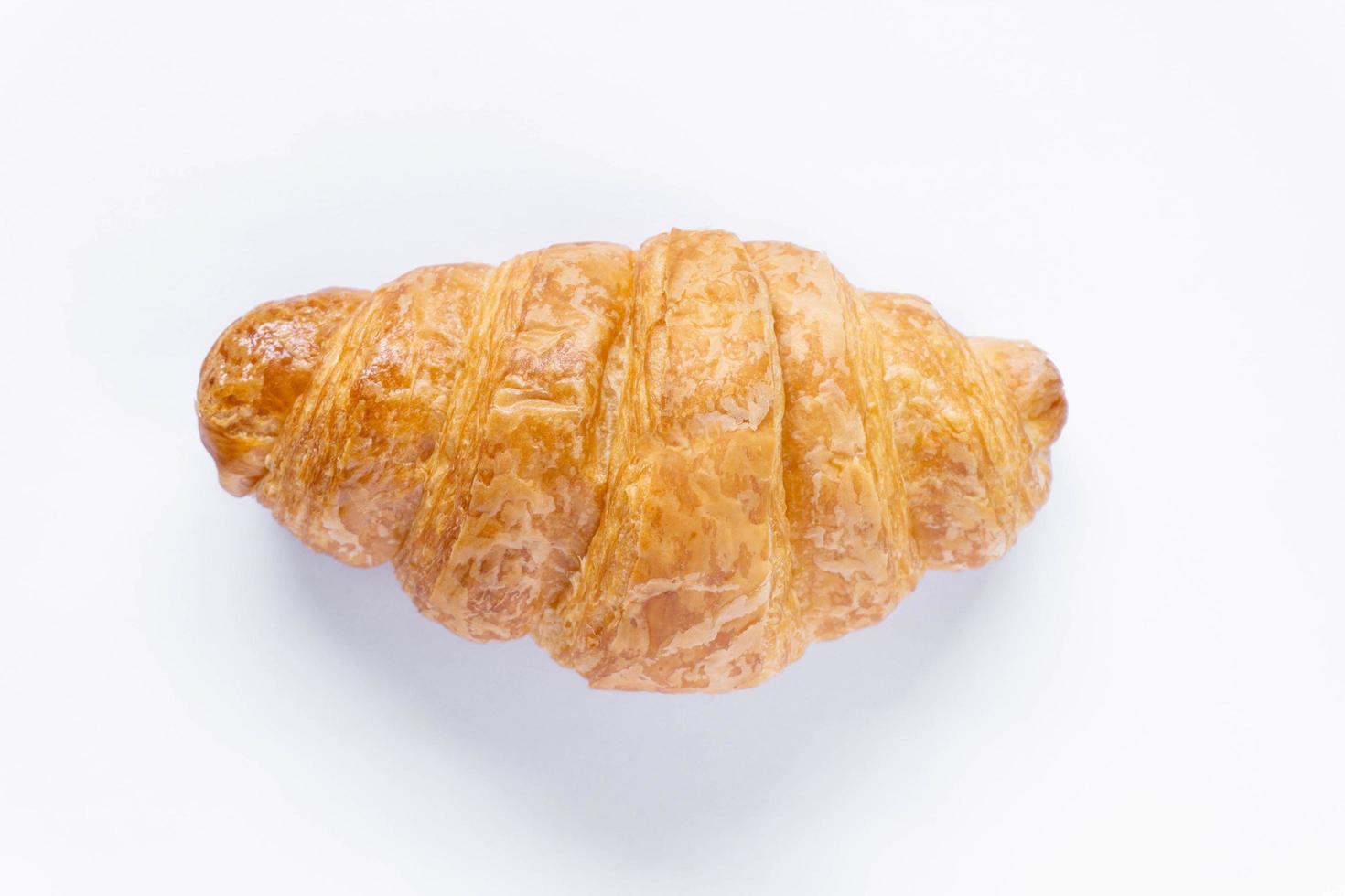 Top view fresh croissant on white background photo