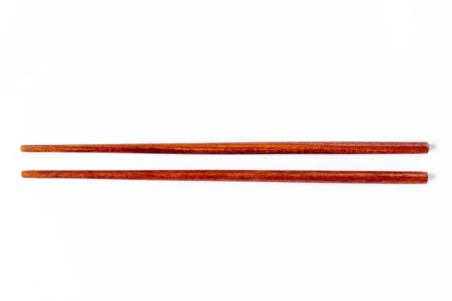 Top view wooden chopsticks on white background photo