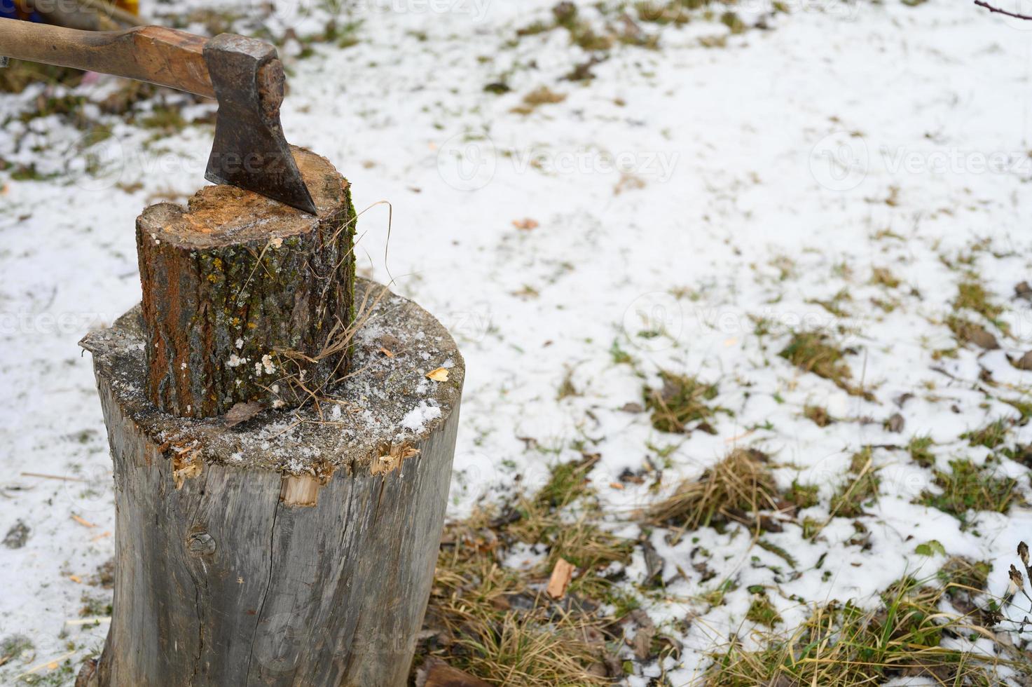 Axe hatchet cut wood winter photo